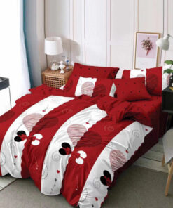 Ropa de cama blanca y rojo y corazones