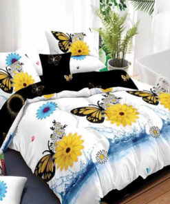 Ropa de cama con mariposas y flores amarillas y azules