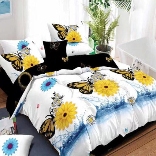 Ropa de cama con mariposas y flores amarillas y azules