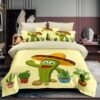 Ropa de cama amarilla y cactus verde