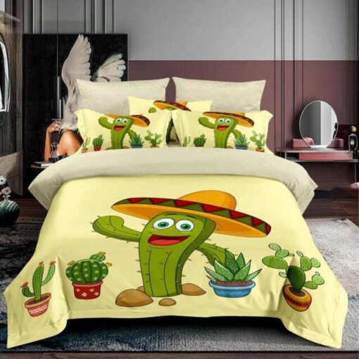 Ropa de cama amarilla y cactus verde