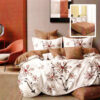 Ropa de cama marron y blanco