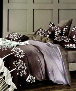 Ropa de cama con arboles blancos