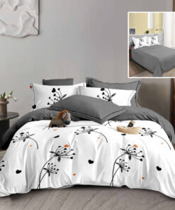Ropa de cama gris y blanco con pequeñas corazones