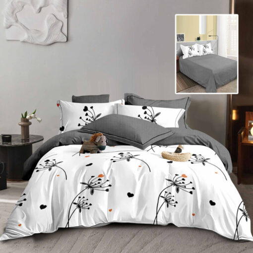 Ropa de cama gris y blanco con pequeñas corazones