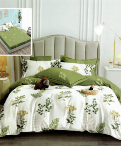 Ropa de cama blanca y verde con hojas
