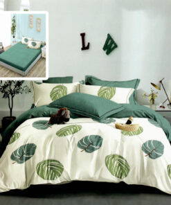 Ropa de cama blanca y verde con hojas verdes