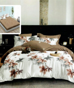 Ropa de cama blanca y marron con ramitas