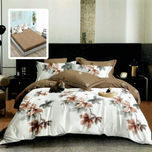 Ropa de cama blanca y marron con ramitas