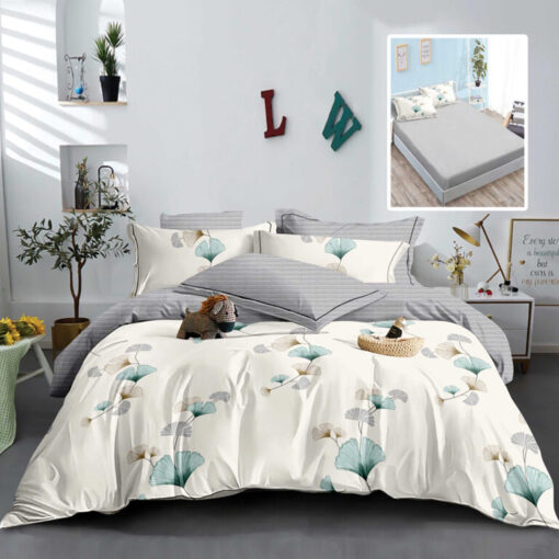 Ropa de cama gris y blanco