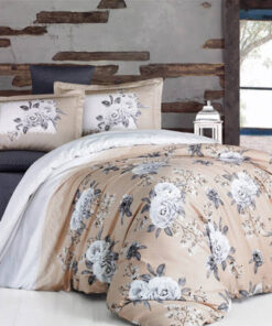 Ropa de cama beige- blanca y negra con flores