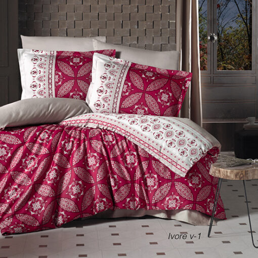 Ropa de cama roja y blanca