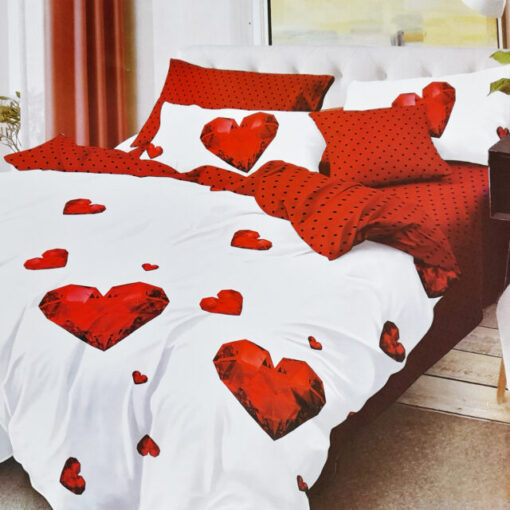 Ropa de cama blanca y roja con corazones
