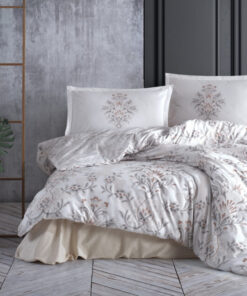 Ropa de cama blanca y beige