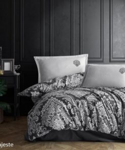 Ropa de cama negra y blanca