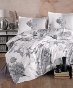 Ropa de cama blanca con flores gris