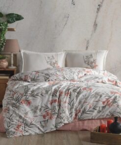 Ropa de cama blanca con copos