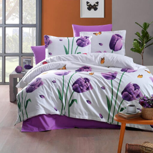 Ropa de cama blanca y lila con tulipanes