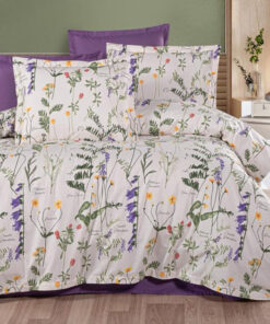 Ropa de cama blanca y lila