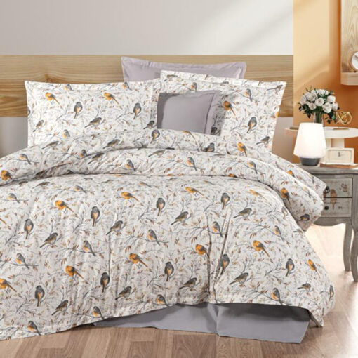 Ropa de cama blanca y gris con pajaritos