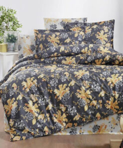 Ropa de cama blanca, negra y amarilla