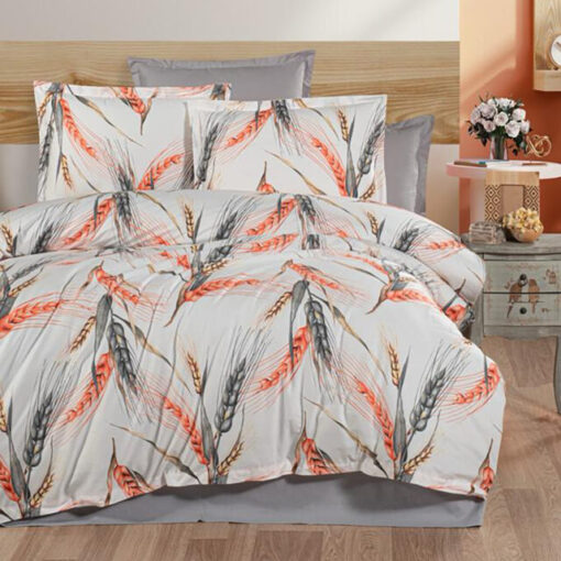 Ropa de cama blanca y gris con plumas