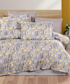 Ropa de cama con flores de manzanilla