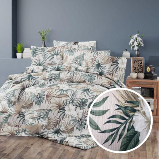 Ropa de cama blanca con ramas marron y verde
