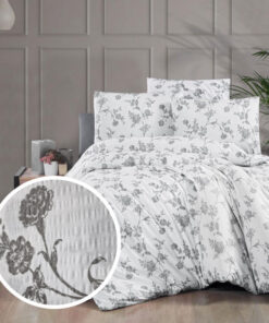 Ropa de cama blanca con flores gris