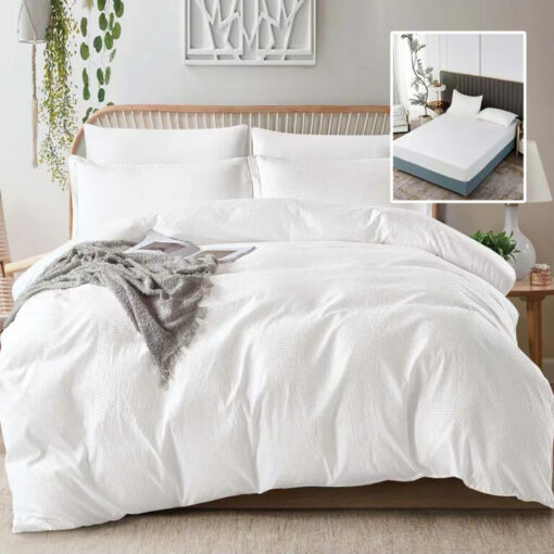 Ropa de cama blanca con sabana bajera