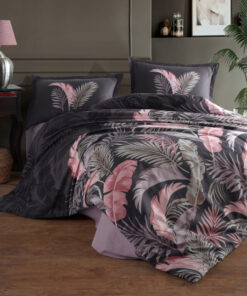 Ropa de cama negra con copos