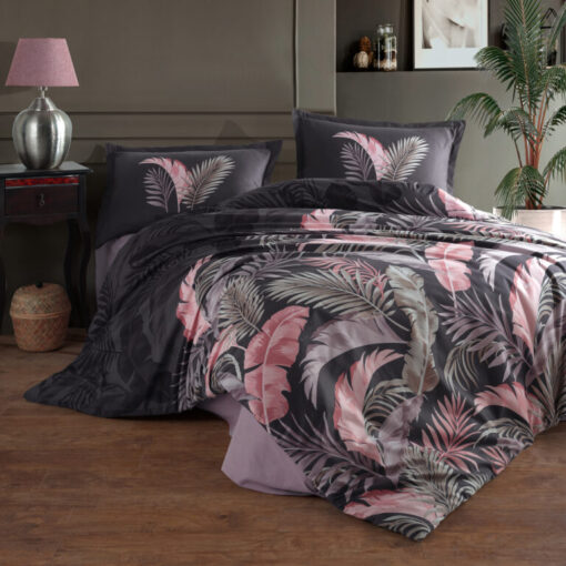 Ropa de cama negra con copos