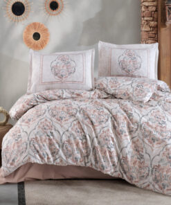Ropa de cama blanca con gris y rosa