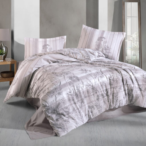 Ropa de cama blanca y gris