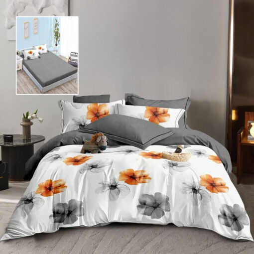 Ropa de cama gris y blanca y flores