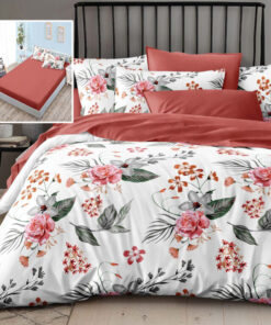 Ropa de cama blanca y roja con flores y hojas