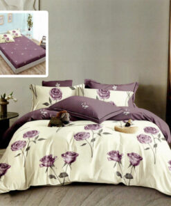 Ropa de cama blanca y lila con flores lila