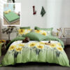 Ropa de cama verde con flores amarillas