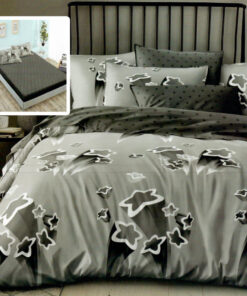 Ropa de cama gris con pequeñas estrellas