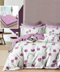 Ropa de cama blanca y lila con flores