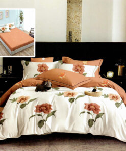 Ropa de cama blanca y naranja con flores