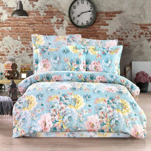 Ropa de cama azul con flores en colores