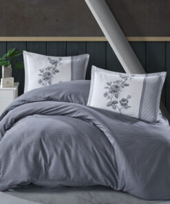 Ropa de cama gris oscuro y blanca