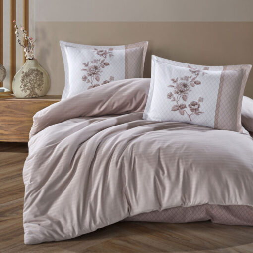 Ropa de cama rosa y blanca