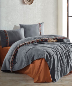 Ropa de cama gris oscuro y naranja