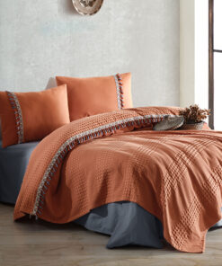 Ropa de cama naranja y gris oscuro